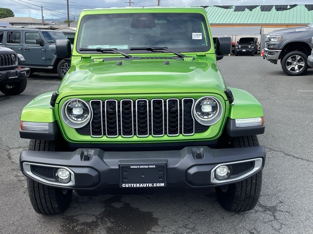 2026 Jeep Wrangler WRANGLER 4-DOOR SAHARA in Mojito Clear-Coat Exterior Paint — front three-quarter view