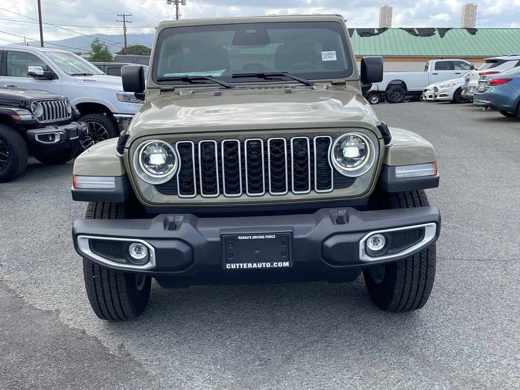 2026 Jeep Wrangler WRANGLER 4-DOOR SAHARA in 41 Exterior Paint — front three-quarter view