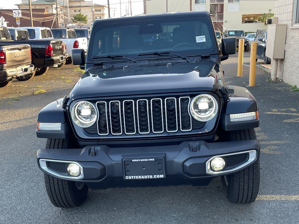 2026 Jeep Wrangler WRANGLER 4-DOOR SAHARA in Black Clear-Coat Exterior Paint — front three-quarter view