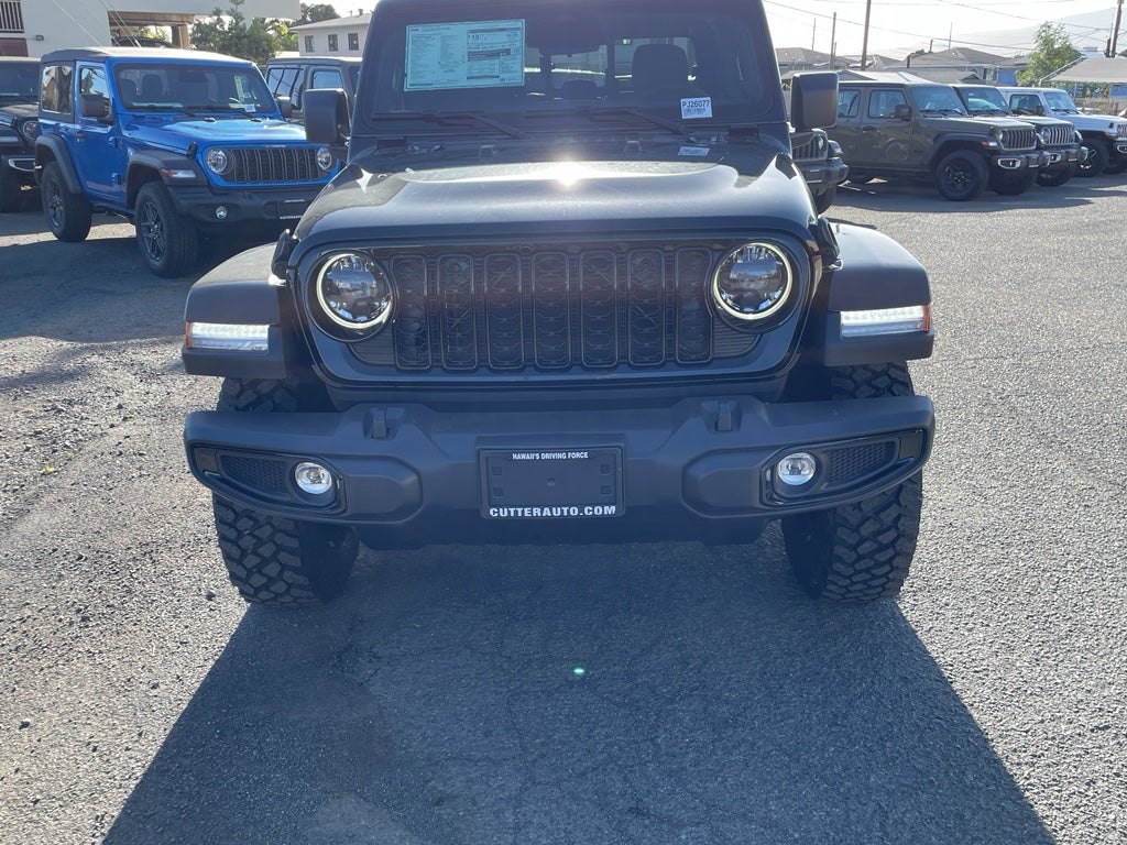 2026 Jeep Gladiator GLADIATOR WILLYS 4X4 in Black Clear-Coat Exterior Paint — front three-quarter view