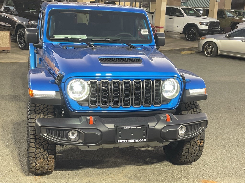 2026 Jeep Gladiator GLADIATOR MOJAVE 4X4 in Hydro Blue Pearl-Coat Exterior Paint — front three-quarter view