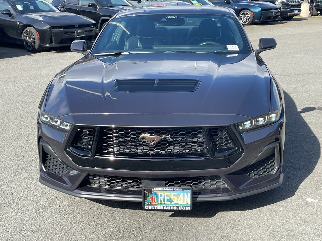 2024 Ford Mustang GT in Black — front three-quarter view