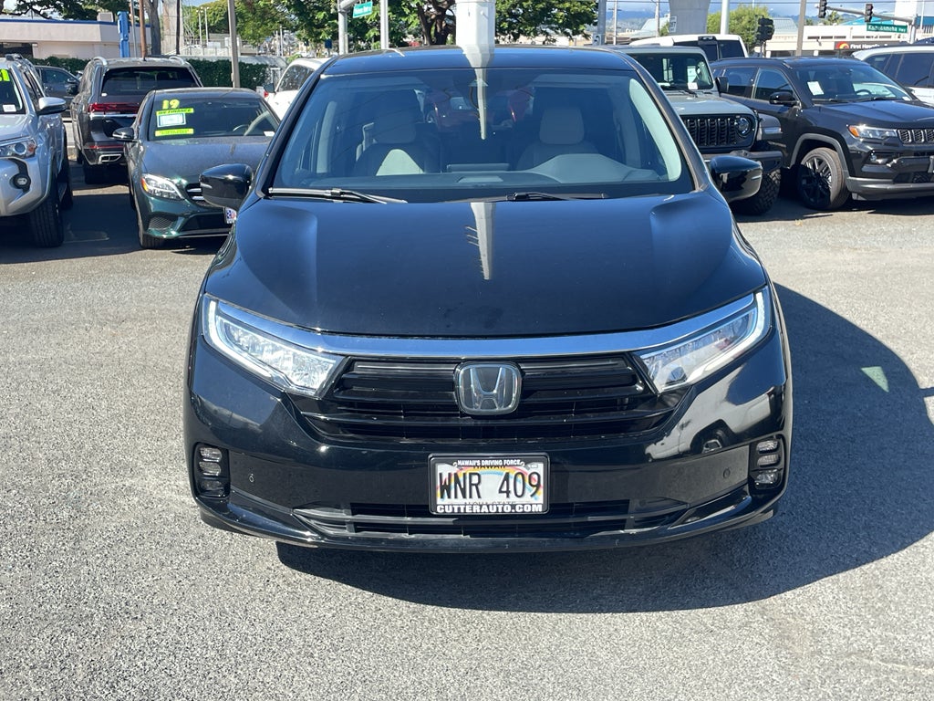 2022 Honda Odyssey Touring in Crystal Black Pearl — front three-quarter view
