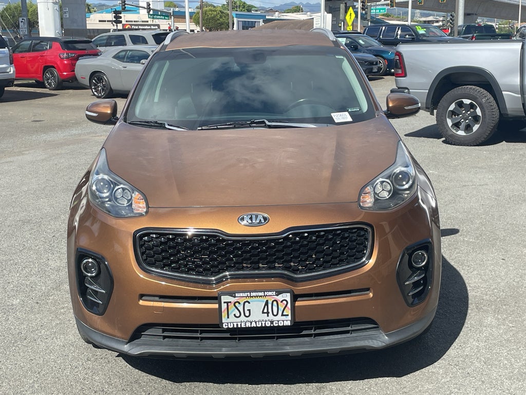 2019 Kia Sportage EX in Burnished Copper — front three-quarter view